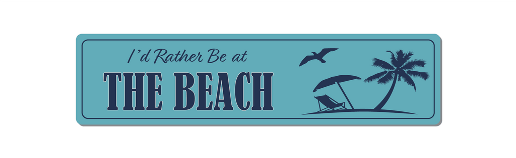 Front view of I'd rather be at the beach aluminium sign. light blue with dark blue text.